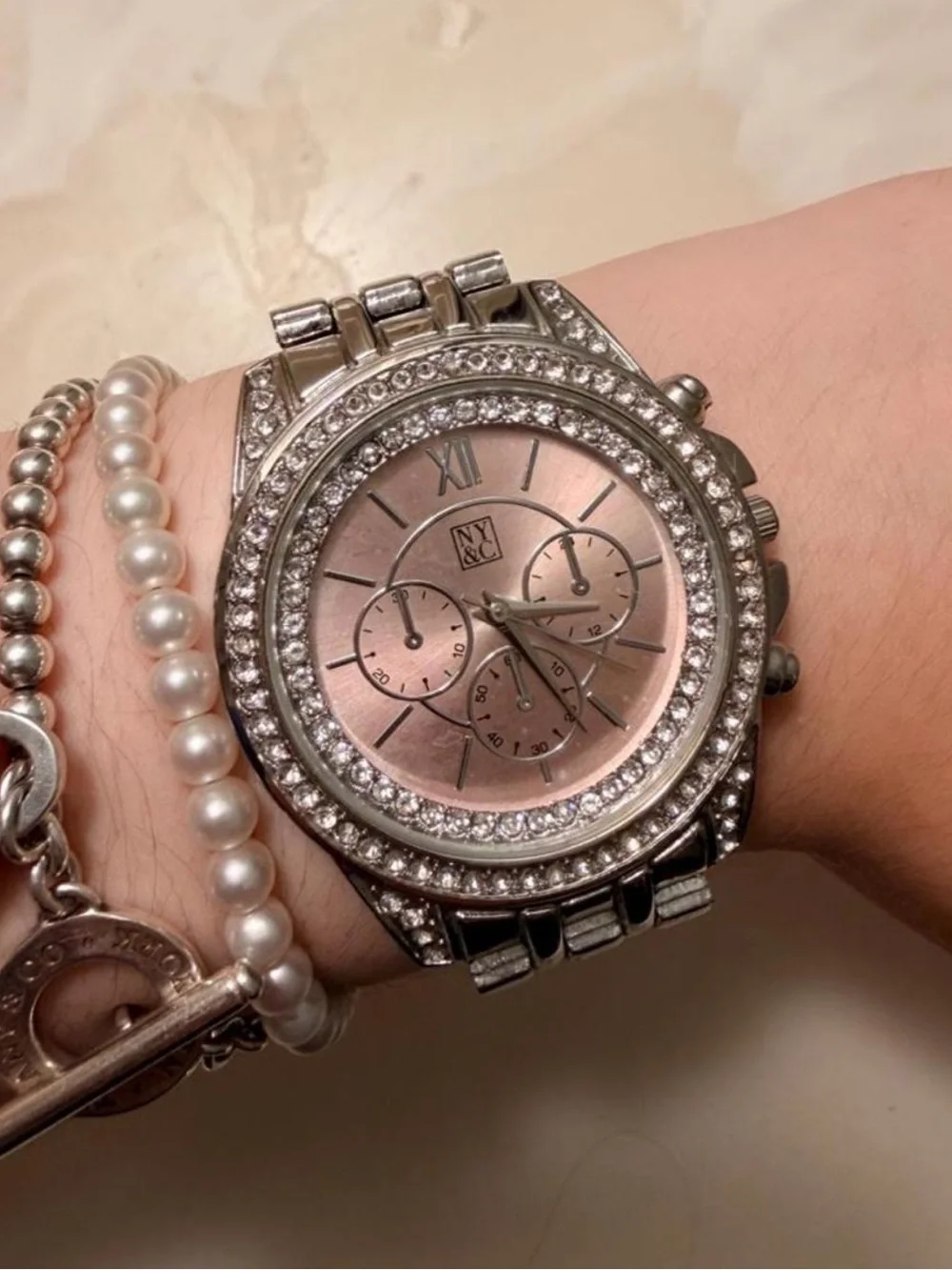 New York & Company Silver Bracelet Watch with Rose Gold Dial and Crystal Bezel